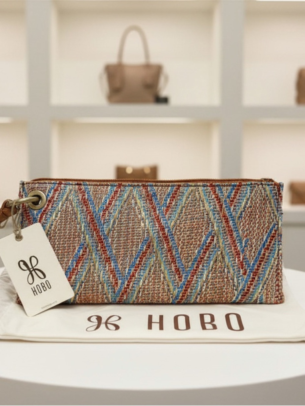 HOBO Chevron Woven Wristlet in Blue, Tan & Red